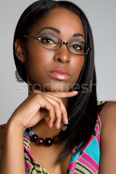 Occhiali donna bella pensare indossare ragazza Foto d'archivio © keeweeboy