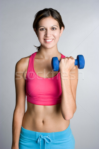 Fitnessz lány emel súlyzók boldog sportok Stock fotó © keeweeboy