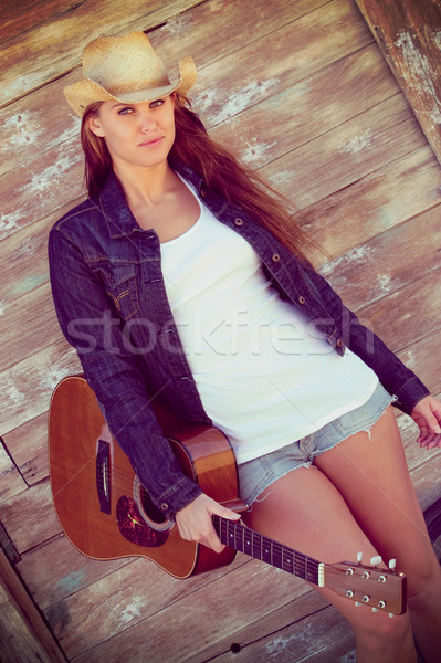 Country Girl Holding Guitar Stock photo © keeweeboy