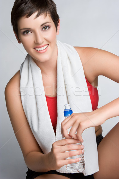 Manierka kobieta dość uśmiechnięty wody twarz Zdjęcia stock © keeweeboy