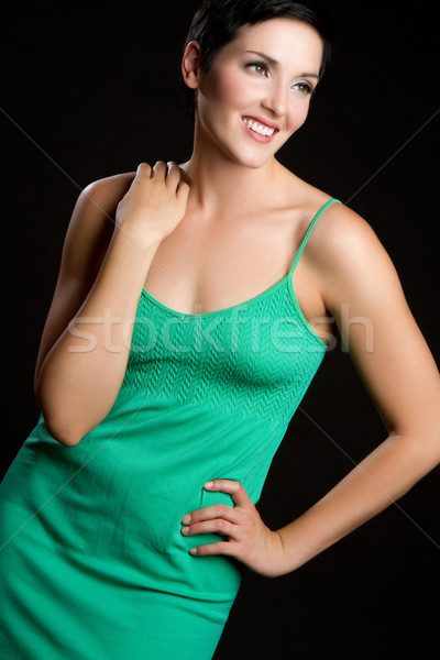 Bella donna sorridente sorridere verde abito donna Foto d'archivio © keeweeboy