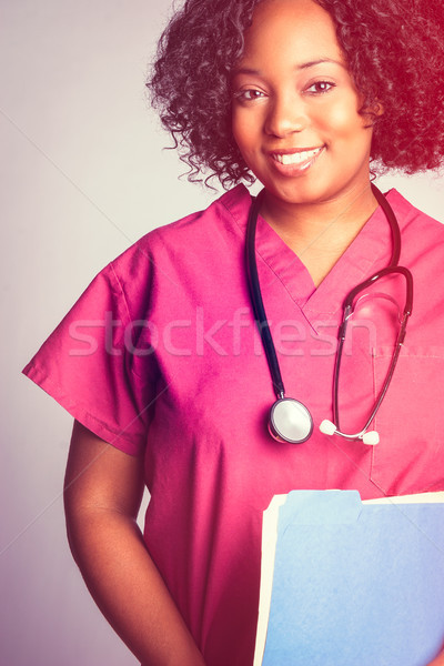 Bella nero infermiera sorridere file Foto d'archivio © keeweeboy