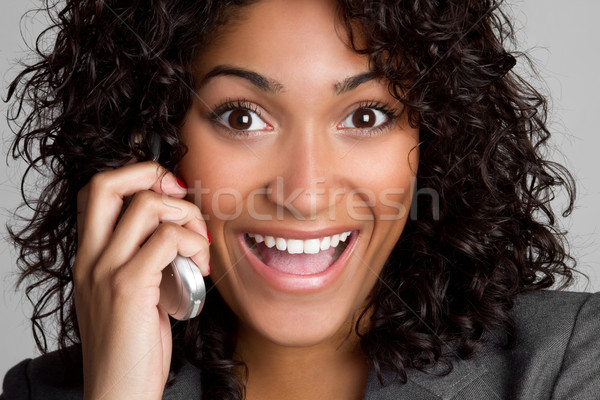 Gelukkig telefoon vrouw zwarte vrouw mobiele telefoon oog Stockfoto © keeweeboy