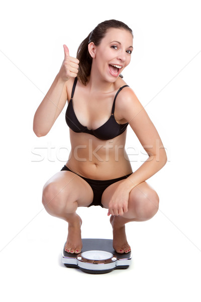 Mujer escala feliz jóvenes grasa Foto stock © keeweeboy