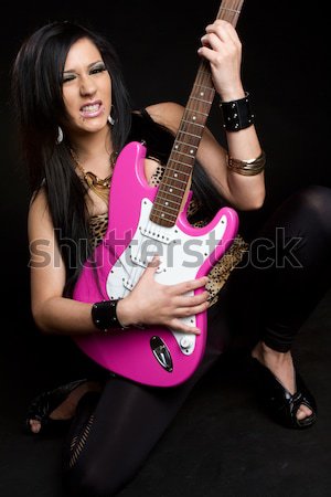 Estrela do rock menina jogar guitarra sensual retrato Foto stock © keeweeboy