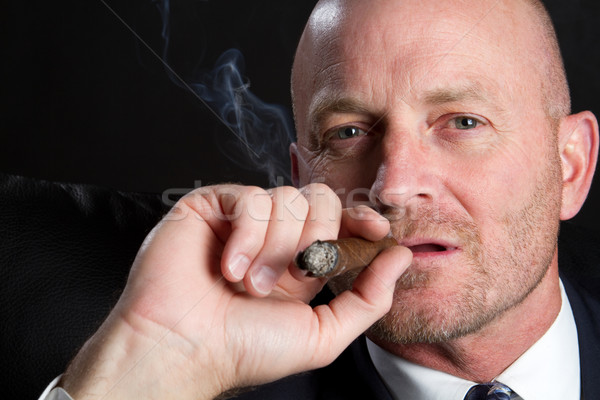 Man Smoking Cigar Stock photo © keeweeboy