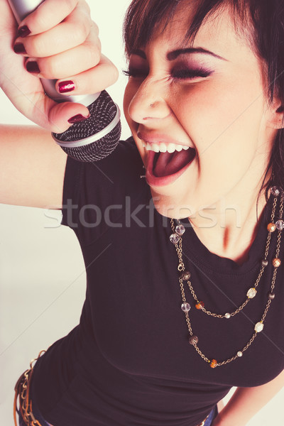 Young Female Singer Stock photo © keeweeboy