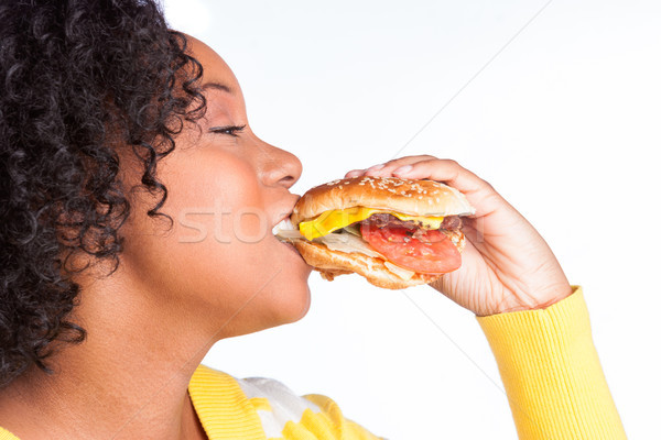 Vrouw eten hamburger mooie zwarte vrouw handen Stockfoto © keeweeboy