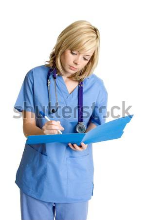 Krankenschwester Notizen ziemlich jungen Gesicht Arzt Stock foto © keeweeboy
