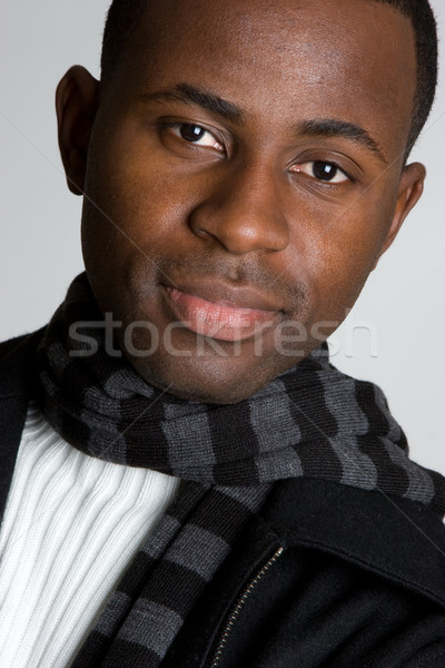 Homem negro bonito sorridente jovem homem moda Foto stock © keeweeboy