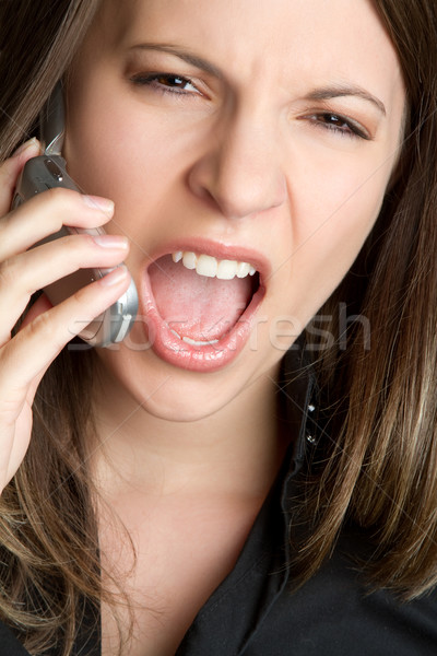 Kiabál telefon nő mérges mobiltelefon mobil Stock fotó © keeweeboy