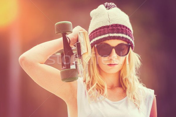 Teen Girl Holding Skateboard Stock photo © keeweeboy