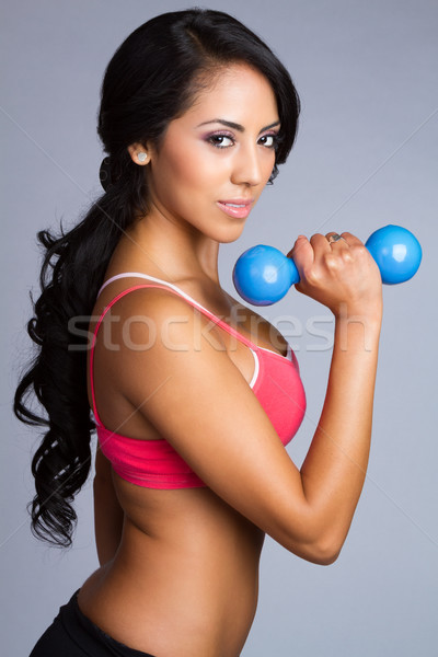 Latin Woman Lifting Weights Stock photo © keeweeboy