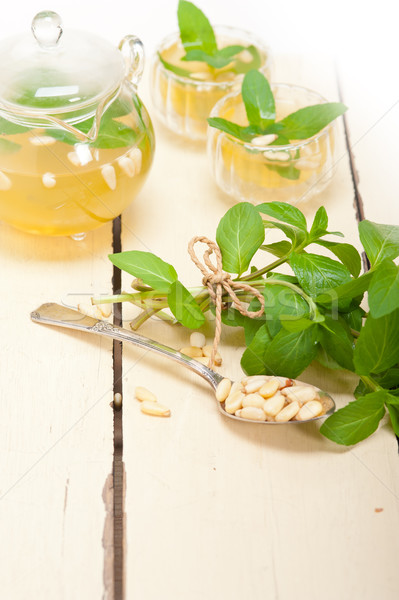 Arab traditional mint and pine nuts tea Stock photo © keko64