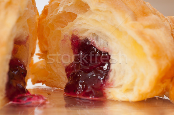Stock photo: croissant French brioche filled with berries jam