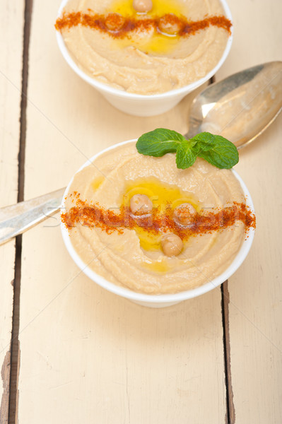 Hummus with mint on top Stock photo © keko64