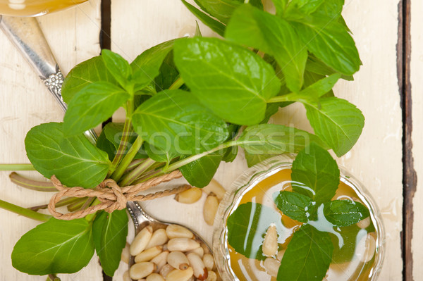 Arab traditional mint and pine nuts tea Stock photo © keko64