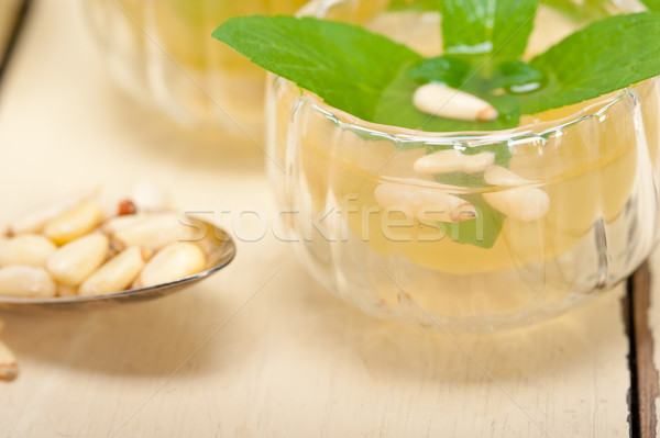 Arab traditional mint and pine nuts tea Stock photo © keko64