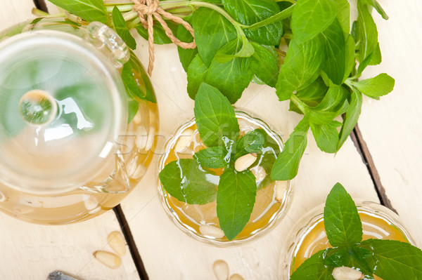 Arab traditional mint and pine nuts tea Stock photo © keko64