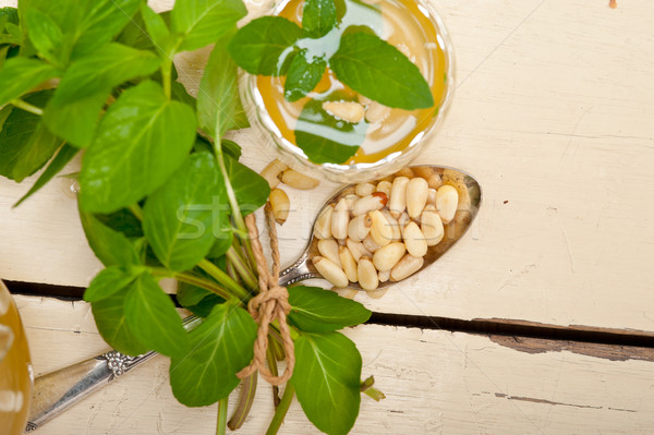 Arab traditional mint and pine nuts tea Stock photo © keko64