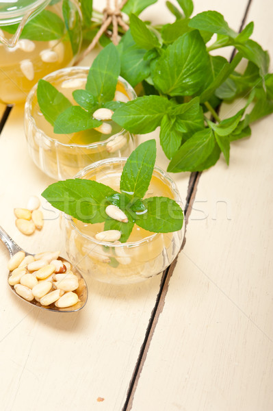 Arab traditional mint and pine nuts tea Stock photo © keko64