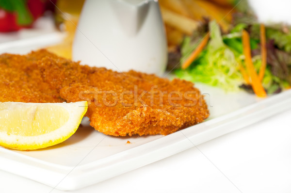 classic Milanese veal cutlets and vegetables Stock photo © keko64