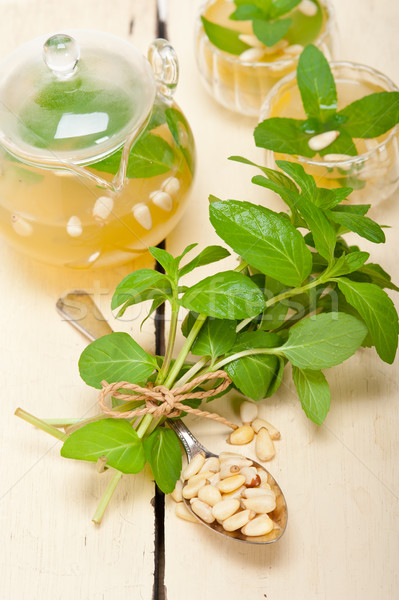 Arab traditional mint and pine nuts tea Stock photo © keko64