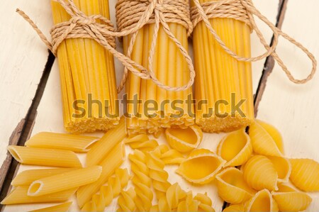 Stock photo: Italian pasta penne with wheat