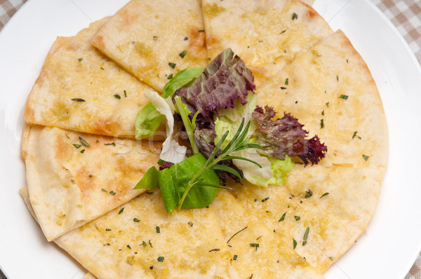 garlic pita bread pizza with salad on top Stock photo © keko64