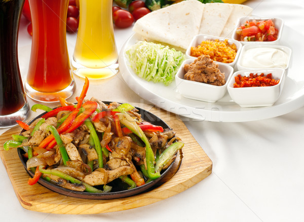 original fajita sizzling hot  on iron plate Stock photo © keko64