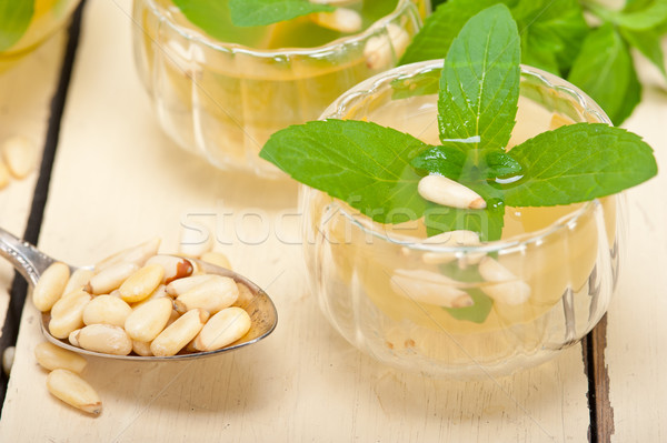 Arab traditional mint and pine nuts tea Stock photo © keko64