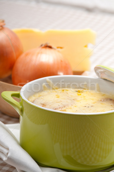 oinion soup with melted cheese and bread on top Stock photo © keko64