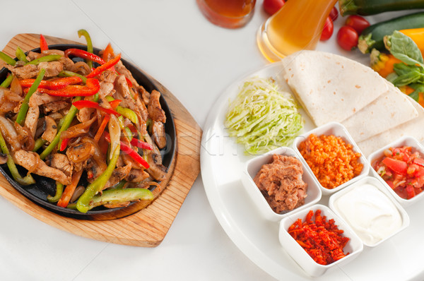 original fajita sizzling hot  on iron plate Stock photo © keko64