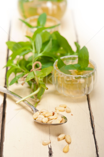 Arab traditional mint and pine nuts tea Stock photo © keko64