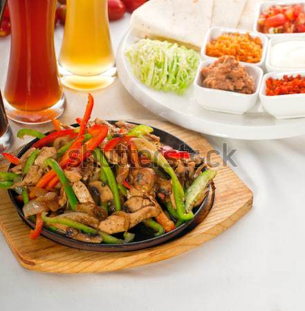 original fajita sizzling hot  on iron plate Stock photo © keko64