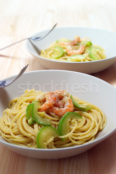 spaghetti pasta with fresh shrimps and zucchini sauce Stock photo © keko64