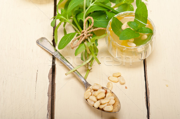 Arab traditional mint and pine nuts tea Stock photo © keko64