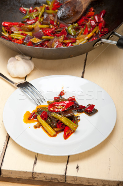 Peperoncino vegetali wok pan ferro Foto d'archivio © keko64
