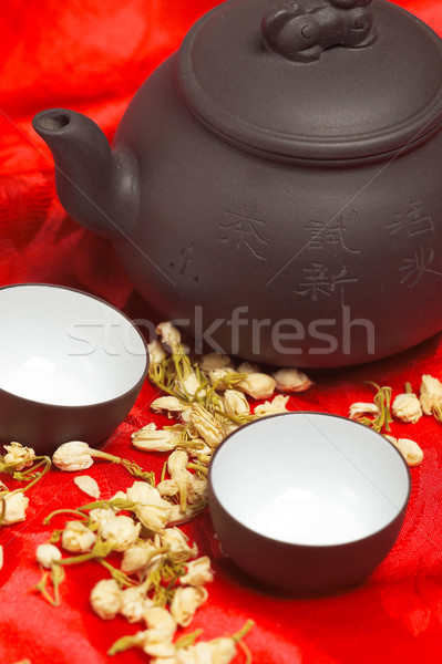 jasmine tea over red silk Stock photo © keko64