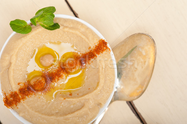 Stock photo: Hummus with mint on top