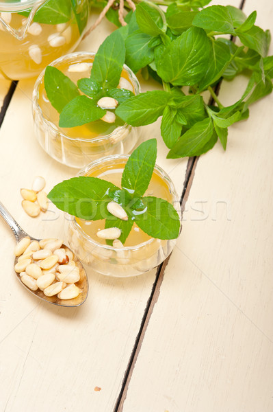 Arab traditional mint and pine nuts tea Stock photo © keko64