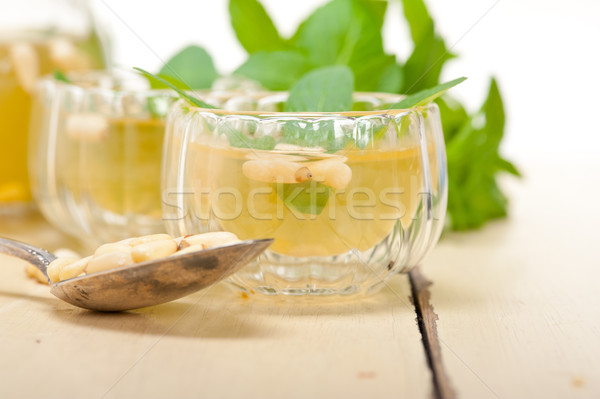 Arab traditional mint and pine nuts tea Stock photo © keko64