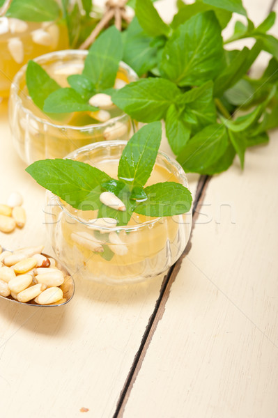 Arab traditional mint and pine nuts tea Stock photo © keko64