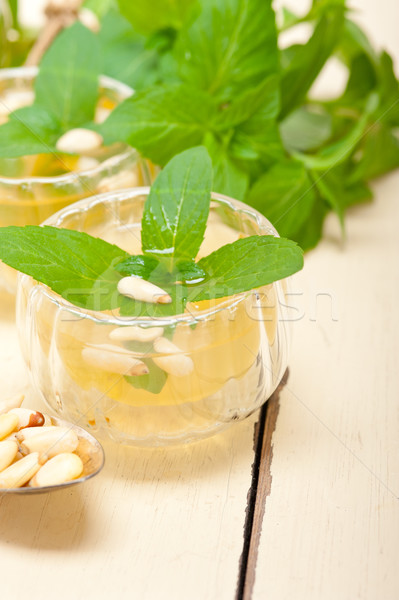 Arab traditional mint and pine nuts tea Stock photo © keko64