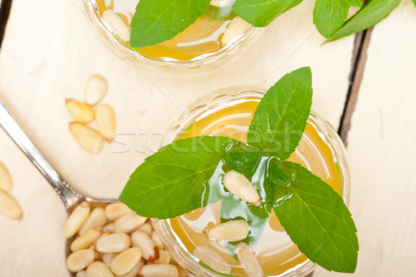 Arab traditional mint and pine nuts tea Stock photo © keko64