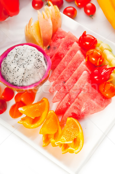 mixed plate of fresh sliced fruits Stock photo © keko64