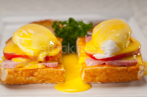 eggs benedict on bread with tomato and ham Stock photo © keko64