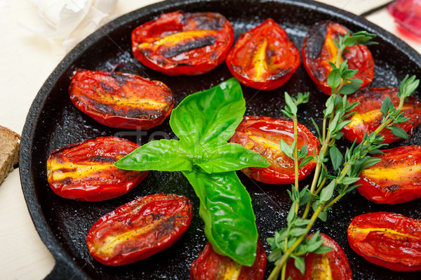 Stock photo: baked cherry tomatoes with basil and thyme