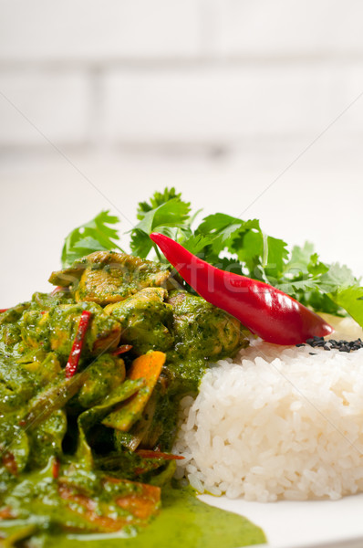 Stock photo: chicken with green curry vegetables and rice