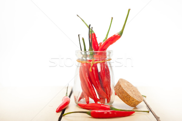 red chili peppers on a glass jar Stock photo © keko64